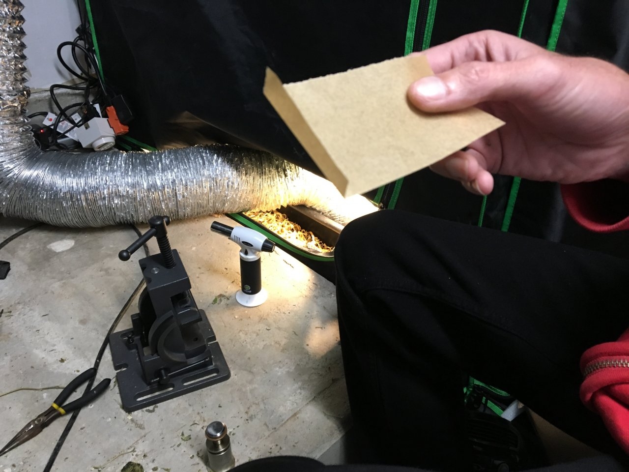 Create a shallow fold to catch the running oil.