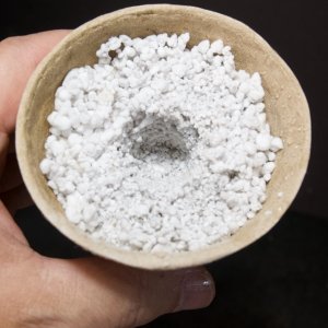 Press Hole into Damp Perlite to Hold Vermiculite