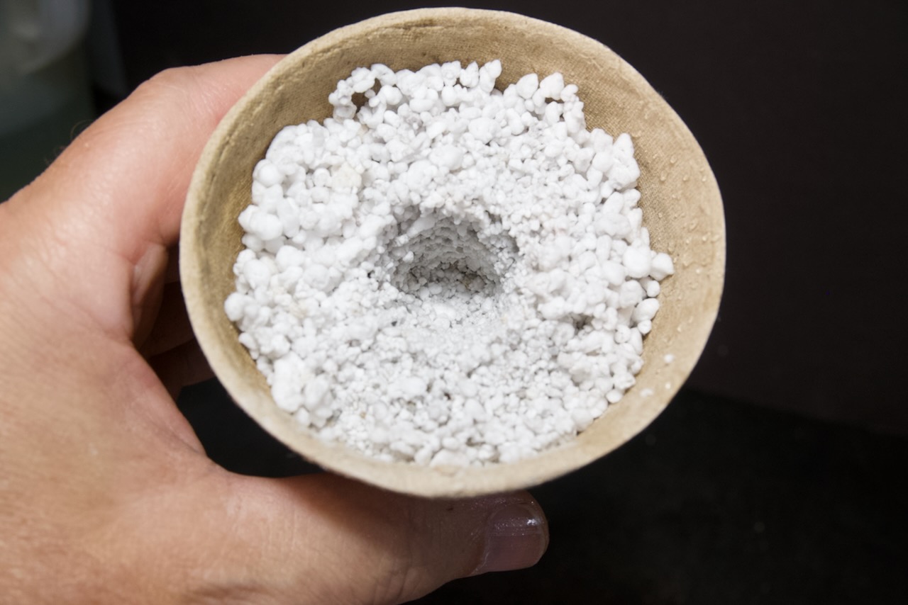 Press Hole into Damp Perlite to Hold Vermiculite