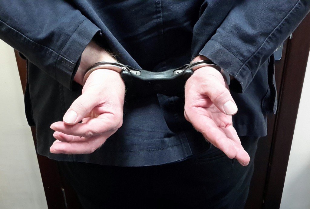 Handcuffed_Man_-_DundeePolice_.jpg