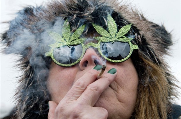 Woman_Smoking_Cannabis_Joint.jpg