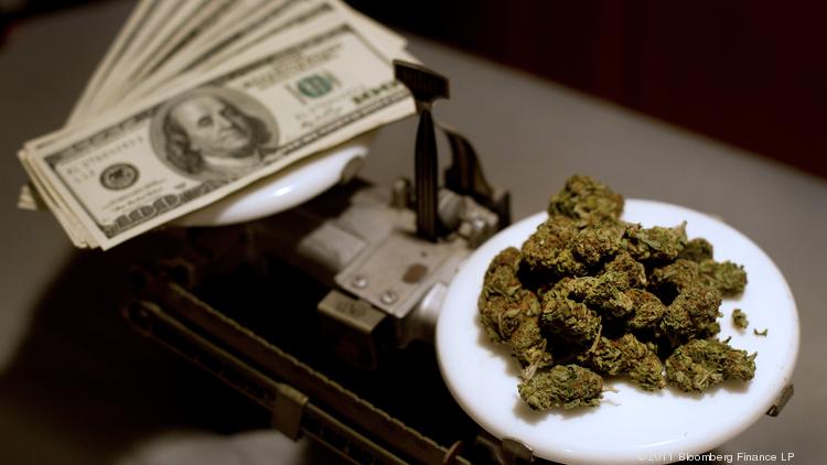 marijuana_vs_cash_on_scales.jpg