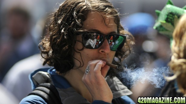 Woman-smoking-pot-at-Toronto-rally-via-Shutterstock-615x3451.jpg