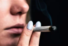 Woman smoking cannabis London