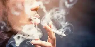 Asian man smoking cannabis Singapore