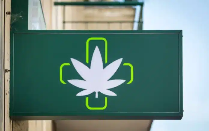 Cannabis dispensary sign double-taxation