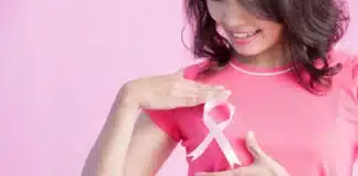 woman with breast cancer ribbon 1 cancer survivor